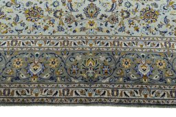Full view of 2000s Kashan rug from Iran / Persia, 423 × 303 cm in Green tones