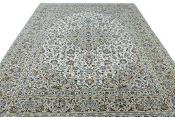 Surface texture of 2000s Kashan rug with natural Wool and intricate pattern
