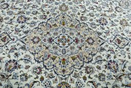 Central medallion detail of 2000s Kashan rug from Iran / Persia