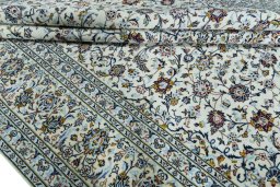 Close-up detail of 2000s Kashan rug from Iran / Persia showing Wool weave