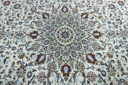 Central medallion detail of 2000s Kashan rug from Iran / Persia