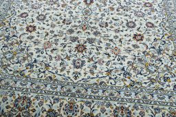 Close-up detail of 2000s Kashan rug from Iran / Persia showing Wool weave