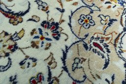 Central medallion detail of 2000s Kashan rug from Iran / Persia