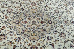 Central medallion detail of 2000s Kashan rug from Iran / Persia