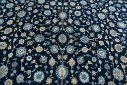 Central medallion detail of 2000s Kashan rug from Iran / Persia