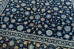 Close-up detail of 2000s Kashan rug from Iran / Persia showing Wool weave