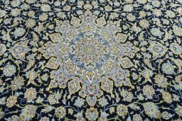 Central medallion detail of 2000s Kashan rug from Iran / Persia
