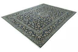Corner detail of 2000s Kashan rug showing border pattern and Wool pile