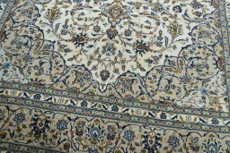 Close-up detail of 2000s Kashan rug from Iran / Persia showing Wool weave