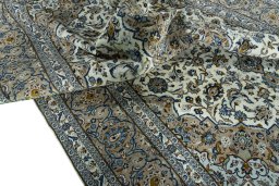 Surface texture of 2000s Kashan rug with natural Wool and intricate pattern