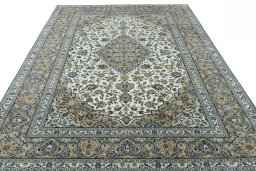 Surface texture of 2000s Kashan rug with natural Wool and intricate pattern