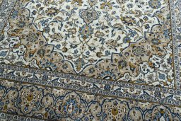 Close-up detail of 2000s Kashan rug from Iran / Persia showing Wool weave