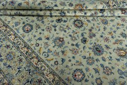 Close-up detail of 2000s Kashan rug from Iran / Persia showing Wool weave