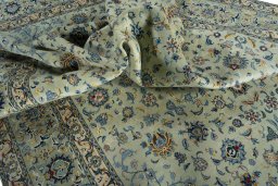 Surface texture of 2000s Kashan rug with natural Wool and intricate pattern