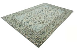 Corner detail of 2000s Kashan rug showing border pattern and Wool pile