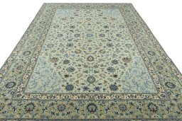 Surface texture of 2000s Kashan rug with natural Wool and intricate pattern