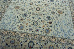 Close-up detail of 2000s Kashan rug from Iran / Persia showing Wool weave