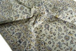 Surface texture of 2000s Kashan rug with natural Wool and intricate pattern