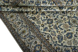 Close-up detail of 2000s Kashan rug from Iran / Persia showing Wool weave