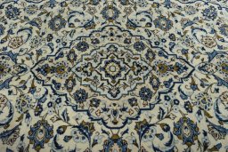 Central medallion detail of 2000s Kashan rug from Iran / Persia