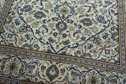 Close-up detail of 2000s Kashan rug from Iran / Persia showing Wool weave