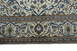 Full view of 2000s Kashan rug from Iran / Persia, 297 × 196 cm in Beige tones