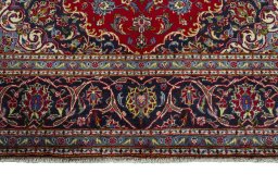 Full view of 2000s Kashan rug from Iran / Persia, 309 × 196 cm in Red tones