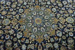 Central medallion detail of 2000s Kashan rug from Iran / Persia