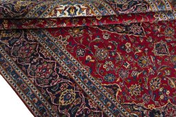 Close-up detail of 2000s Kashan rug from Iran / Persia showing Wool weave