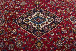 Central medallion detail of 2000s Kashan rug from Iran / Persia