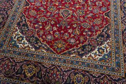Close-up detail of 2000s Kashan rug from Iran / Persia showing Wool weave