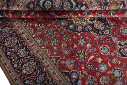 Close-up detail of 2000s Kashan rug from Iran / Persia showing Wool weave