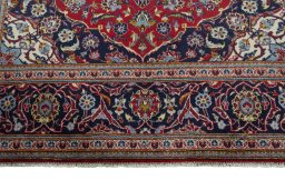 Full view of 2000s Kashan rug from Iran / Persia, 291 × 201 cm in Red tones