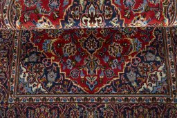 Close-up detail of 2000s Kashan rug from Iran / Persia showing Wool weave