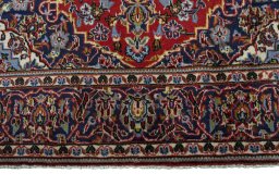 Full view of 2000s Kashan rug from Iran / Persia, 166 × 103 cm in Red tones
