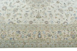 Corner detail of New Kashan rug showing border pattern and Wool pile