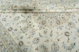 Close-up detail of New Kashan rug from Iran / Persia showing Wool weave