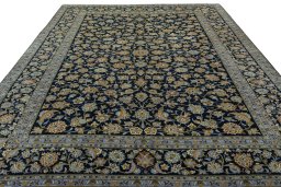 Surface texture of 2000s Kashan rug with natural Wool and intricate pattern