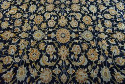 Central medallion detail of 2000s Kashan rug from Iran / Persia