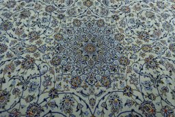 Central medallion detail of 2000s Kashan rug from Iran / Persia