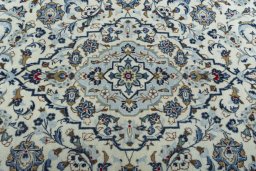 Central medallion detail of 2000s Kashan rug from Iran / Persia