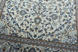 Close-up detail of 2000s Kashan rug from Iran / Persia showing Wool weave