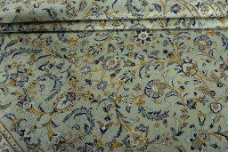 Close-up detail of 2000s Kashan rug from Iran / Persia showing Wool weave