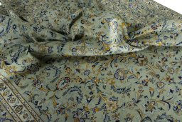 Surface texture of 2000s Kashan rug with natural Wool and intricate pattern