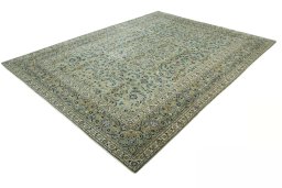Corner detail of 2000s Kashan rug showing border pattern and Wool pile