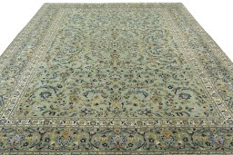 Surface texture of 2000s Kashan rug with natural Wool and intricate pattern