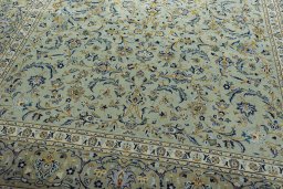 Close-up detail of 2000s Kashan rug from Iran / Persia showing Wool weave
