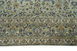 Full view of 2000s Kashan rug from Iran / Persia, 396 × 305 cm in Green tones