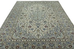 Surface texture of 2000s Kashan rug with natural Wool and intricate pattern