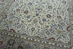 Close-up detail of 2000s Kashan rug from Iran / Persia showing Wool weave